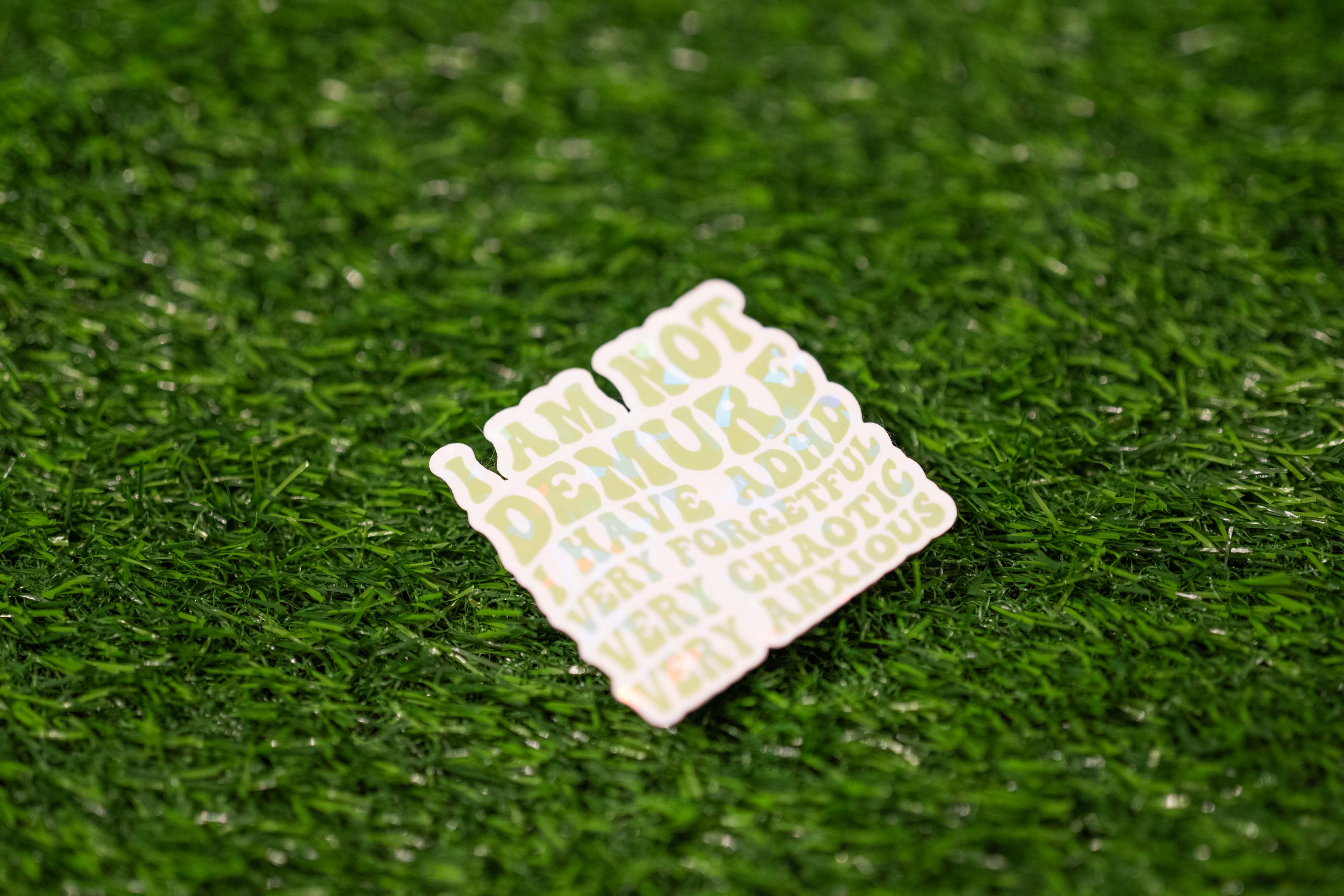 "I am not demure I have ADHD very forgetful very chaotic very anxious" Sticker (Single)